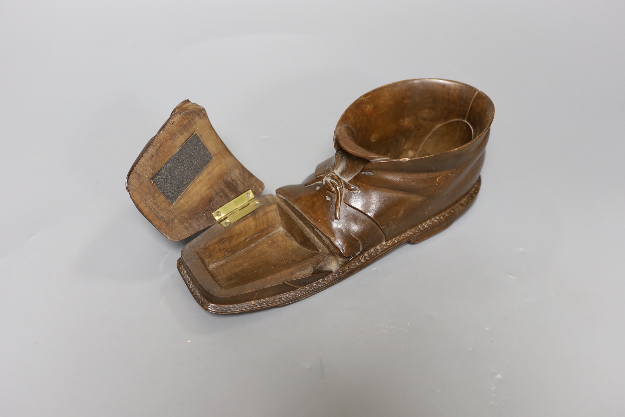 An early 20th century Swiss Caux treen 'boot' vesta case, 22cm long